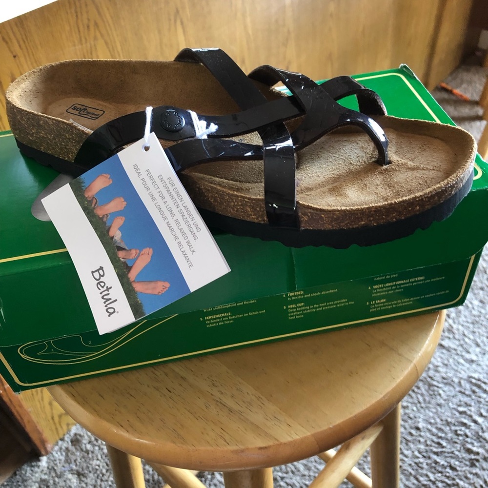 Brand new Birkenstock’s dark brown croc size 11